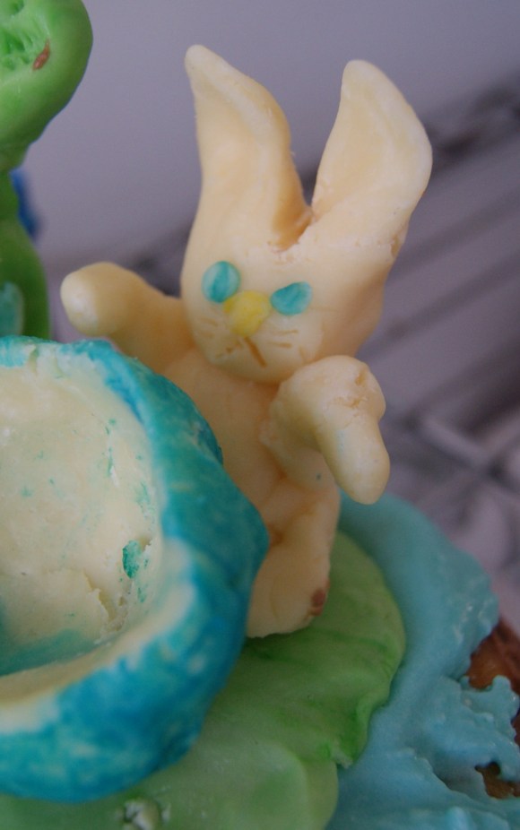 This is the Easter Bunny. I wanted him to look joyful. I can see that he looks more like "My presence is present enough, kiss my cottontail."