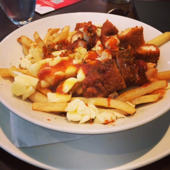 This is poutine. You're going to hear the word poutine a lot in this post, so I might as well show you what it is in all its glory.