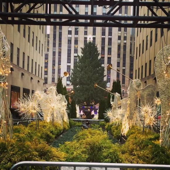 It's the Rockefeller tree, ya'll! Granted, it has yet to be lit and also this picture is from around this time last year but... holiday spirit?
